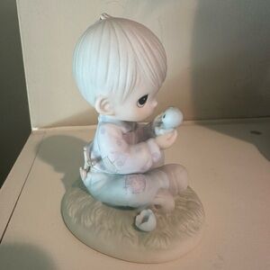Precious Moments Figurine “I Believe In Miracles”